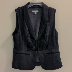 Grey/tweed vest.